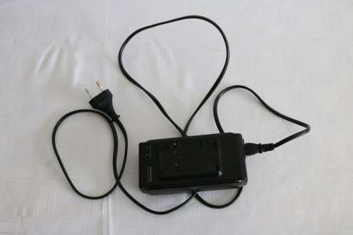 A Panasonic NV-R55 VHS movie camera with battery, charger and one cassette - in working condition!