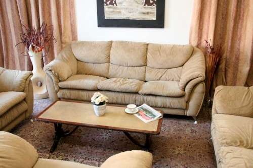 A fantastic, large comfortable four piece Beige lounge suite, perfect in informal lounges!