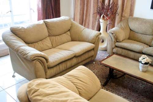 A fantastic, large comfortable four piece Beige lounge suite, perfect in informal lounges!