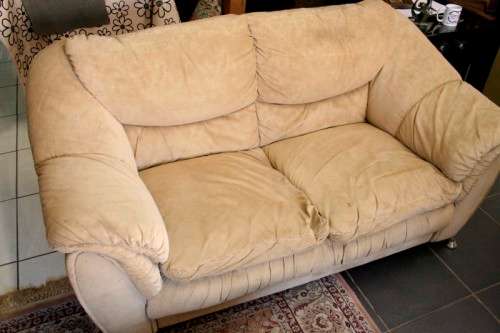 A fantastic, large comfortable four piece Beige lounge suite, perfect in informal lounges!
