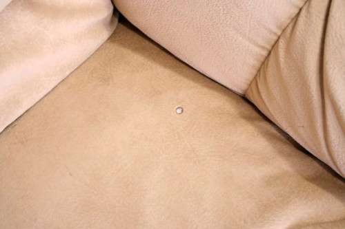 A fantastic, large comfortable four piece Beige lounge suite, perfect in informal lounges!