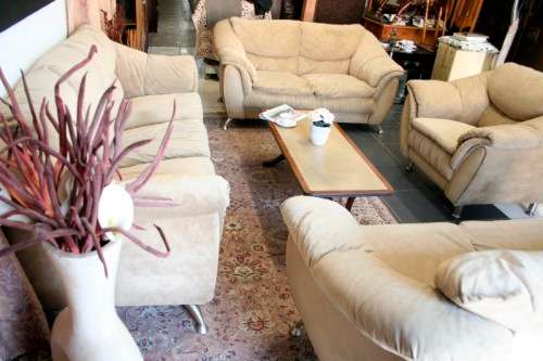 A fantastic, large comfortable four piece Beige lounge suite, perfect in informal lounges!