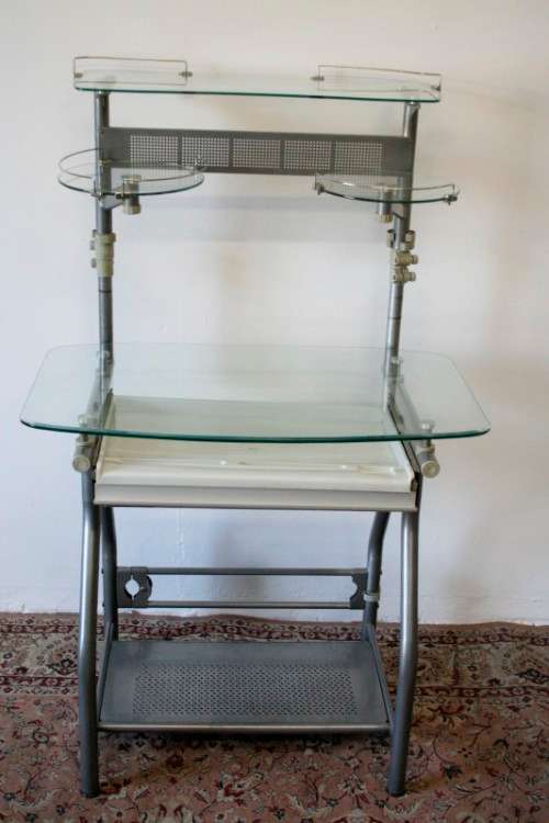 A lovely modern styled silver metal glass top compact computer desk/ stand in good condition
