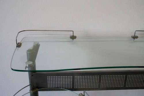 A lovely modern styled silver metal glass top compact computer desk/ stand in good condition