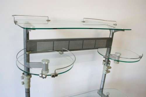A lovely modern styled silver metal glass top compact computer desk/ stand in good condition
