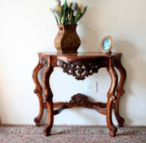 A spectacular antique Victorian half moon occasional/ hallway table with a marble inlay.