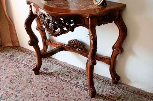 A spectacular antique Victorian half moon occasional/ hallway table with a marble inlay.