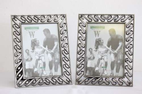 Two beautifully ornate metal free-standing photo frames - perfect for family pics - an awesome gift!