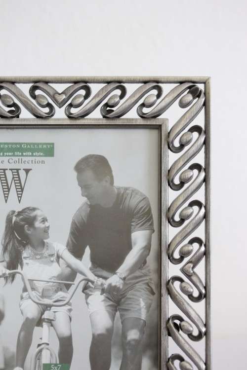 Two beautifully ornate metal free-standing photo frames - perfect for family pics - an awesome gift!