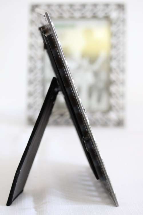 Two beautifully ornate metal free-standing photo frames - perfect for family pics - an awesome gift!