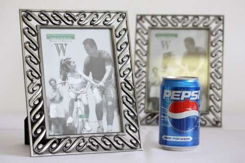 Two beautifully ornate metal free-standing photo frames - perfect for family pics - an awesome gift!
