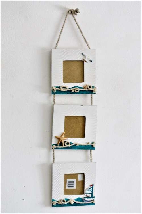 **RS17** A wonderful 3-photo wall hanging picture frame with a beach/ holiday theme to it