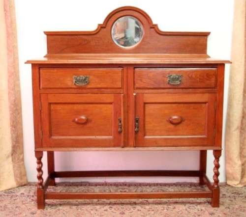 A stunning antique oak side server cabinet with a bevelled mirror, loads of drawer & cupboard space