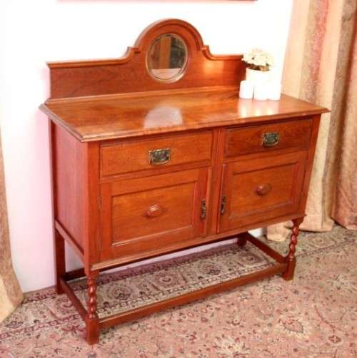 A stunning antique oak side server cabinet with a bevelled mirror, loads of drawer & cupboard space