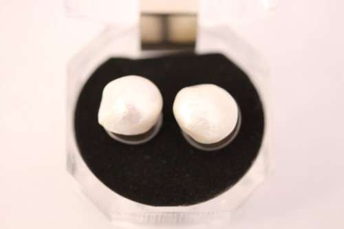 An amazing pair of white cultured baroque pearl earrings in a stunning see-through gift box