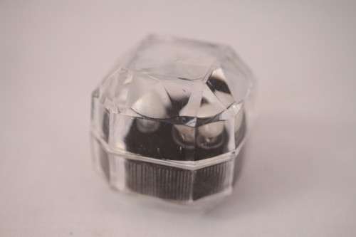 An amazing pair of white cultured baroque pearl earrings in a stunning see-through gift box