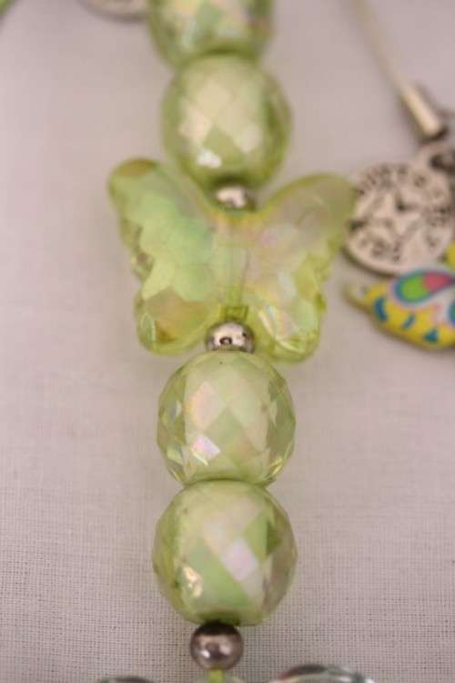**RS17** A green "Butterfly Kidz" Giggly "I am special" fashion charm key chain in good condition