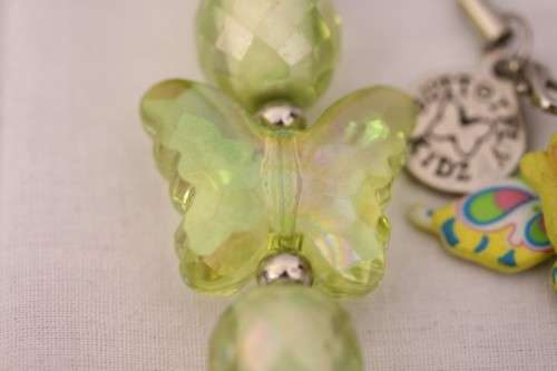 **RS17** A green "Butterfly Kidz" Giggly "I am special" fashion charm key chain in good condition