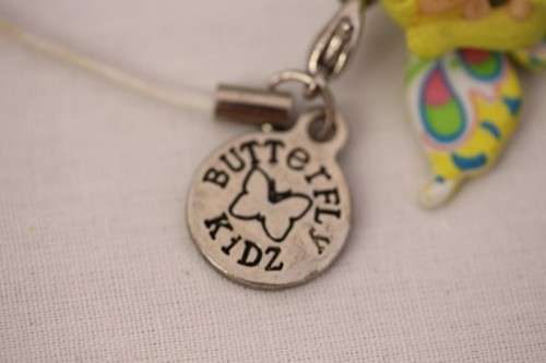 **RS17** A green "Butterfly Kidz" Giggly "I am special" fashion charm key chain in good condition