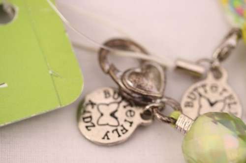 **RS17** A green "Butterfly Kidz" Giggly "I am special" fashion charm key chain in good condition