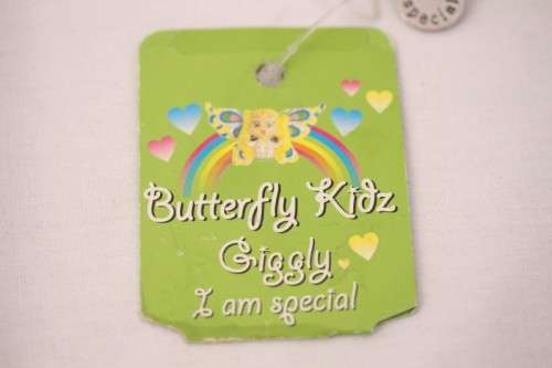 **RS17** A green "Butterfly Kidz" Giggly "I am special" fashion charm key chain in good condition