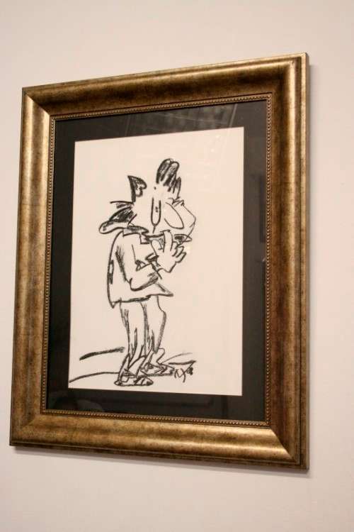 **RS17** A fantastic framed behind glass charcoal sketch signed "Michaloo", stunning art.