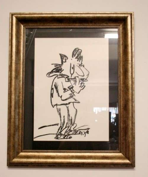 **RS17** A fantastic framed behind glass charcoal sketch signed "Michaloo", stunning art.