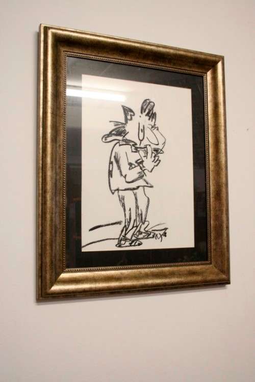 **RS17** A fantastic framed behind glass charcoal sketch signed "Michaloo", stunning art.
