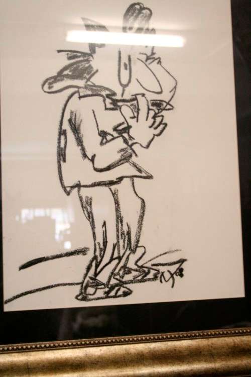 **RS17** A fantastic framed behind glass charcoal sketch signed "Michaloo", stunning art.