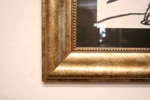 **RS17** A fantastic framed behind glass charcoal sketch signed "Michaloo", stunning art.