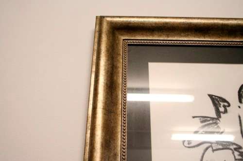 **RS17** A fantastic framed behind glass charcoal sketch signed "Michaloo", stunning art.