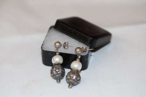A beautiful pair of Vintage styled genuine cultured baroque pearl and ornate silver beaded earrings