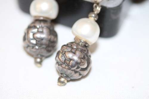 A beautiful pair of Vintage styled genuine cultured baroque pearl and ornate silver beaded earrings