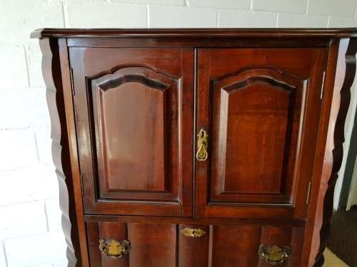 A beautiful vintage ball and claw cocktail cabinet with three spacious drawers and brass handles!!