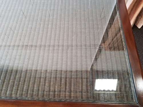 PRICE DRASTICALLY REDUCED!!! A 10-12 seater Mahogany & wicker table with a glass top!