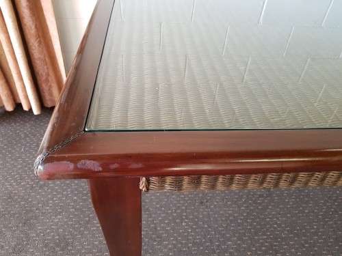PRICE DRASTICALLY REDUCED!!! A 10-12 seater Mahogany & wicker table with a glass top!