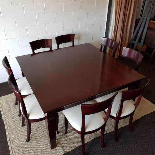 A Spectacular modern 8-seater Mahogany square dining room suite in excellent condition - WOW!!