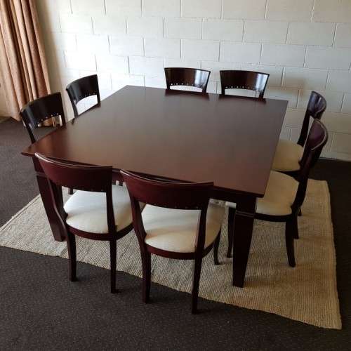 A Spectacular modern 8-seater Mahogany square dining room suite in excellent condition - WOW!!