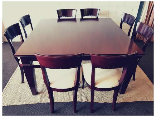 A Spectacular modern 8-seater Mahogany square dining room suite in excellent condition - WOW!!