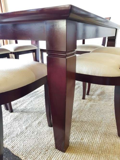 A Spectacular modern 8-seater Mahogany square dining room suite in excellent condition - WOW!!