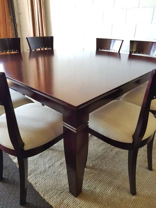 A Spectacular modern 8-seater Mahogany square dining room suite in excellent condition - WOW!!