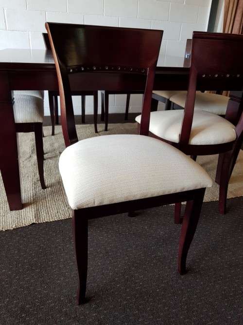 A Spectacular modern 8-seater Mahogany square dining room suite in excellent condition - WOW!!