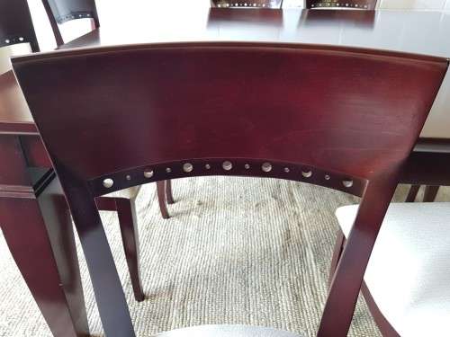 A Spectacular modern 8-seater Mahogany square dining room suite in excellent condition - WOW!!