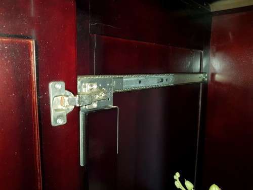 A gorgeous mahogany TV-Cabinet with two doors and ample space for an entertainment system