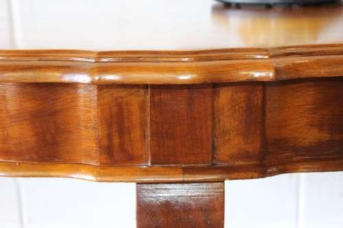 An amazing vintage (larger than normal) Stinkwood ball & claw half moon display/occasional table