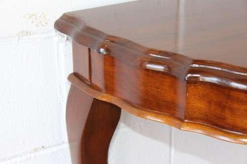 An amazing vintage (larger than normal) Stinkwood ball & claw half moon display/occasional table