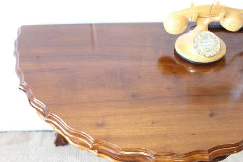 An amazing vintage (larger than normal) Stinkwood ball & claw half moon display/occasional table