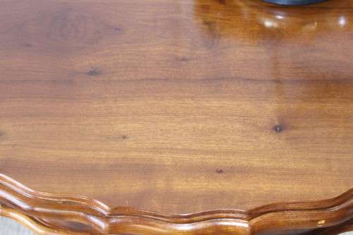 An amazing vintage (larger than normal) Stinkwood ball & claw half moon display/occasional table