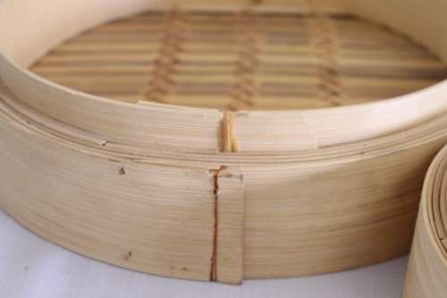 A set of 3x different size (18xm, 25cm & 31cm) natural bamboo steamers including a 2-tier steamer
