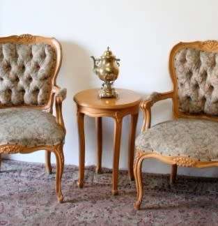 A stunning round vintage Oak occasional/side table with carved detailing.